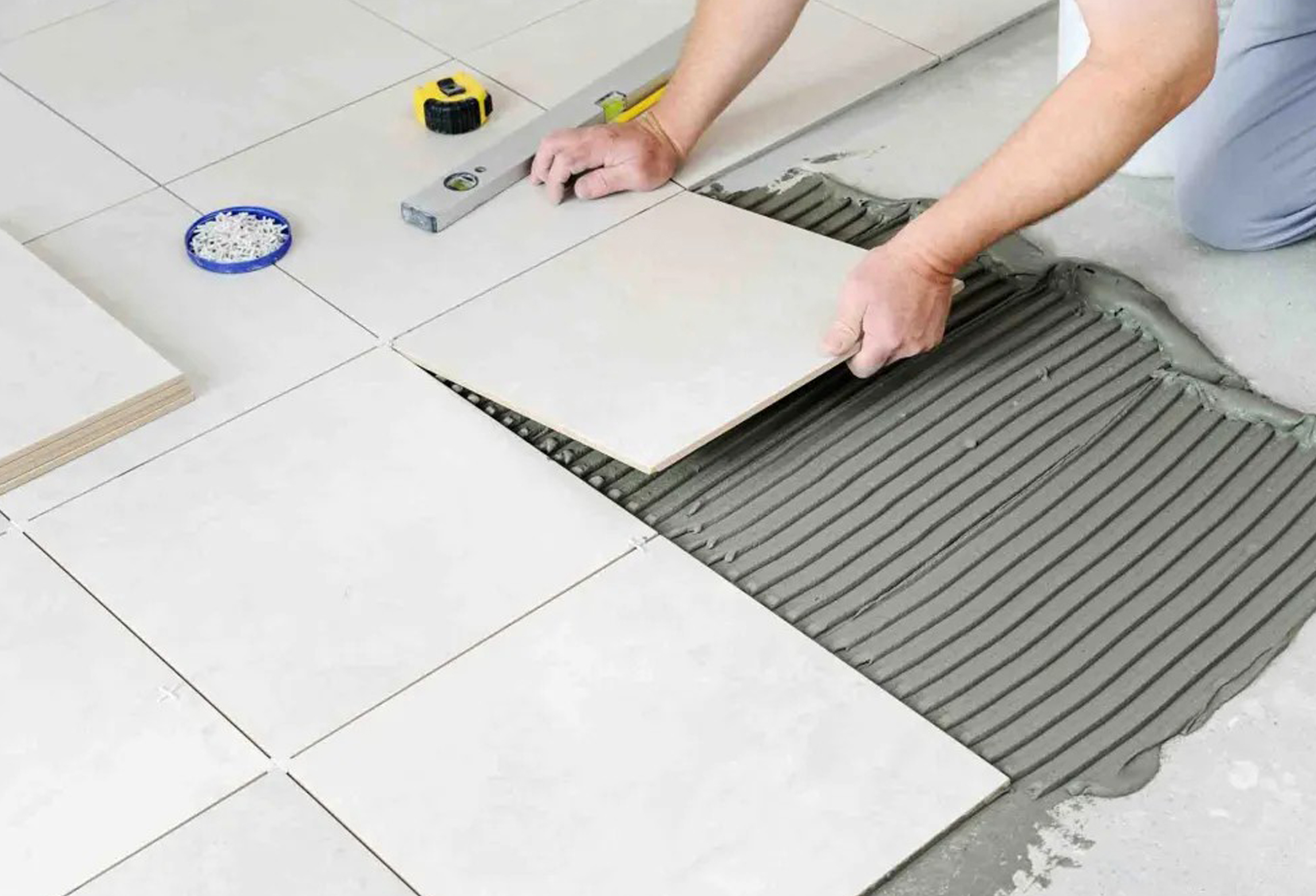 Installing the floor tiles